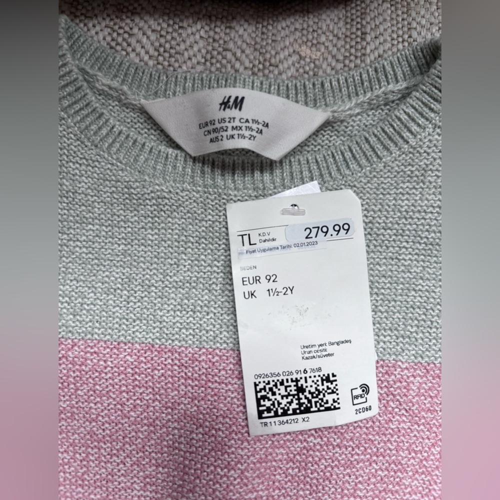 New pink sweater from H&M, never been worn. Kept in a smoke and pet free home.